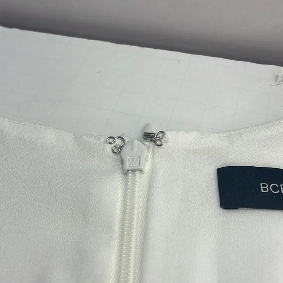 BCBGMaxAzria off-white peplum top size xs 0/2 - Picture 5 of 5